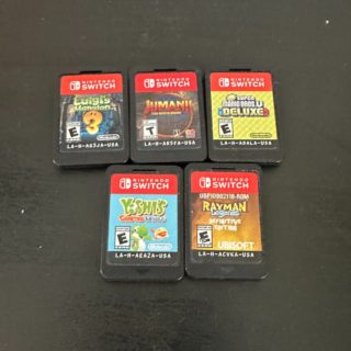 Nitendo Switch Game cartridges sitting on a table