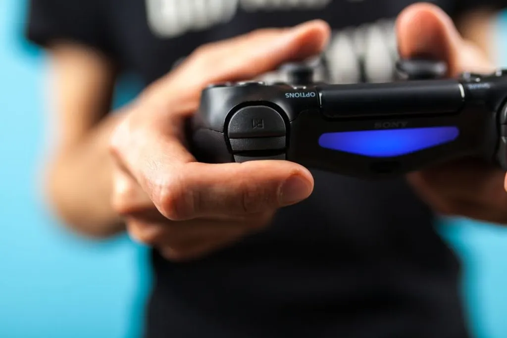 Player using a PS4 controller