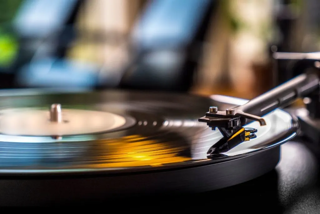 Record player playing on the edge of the record